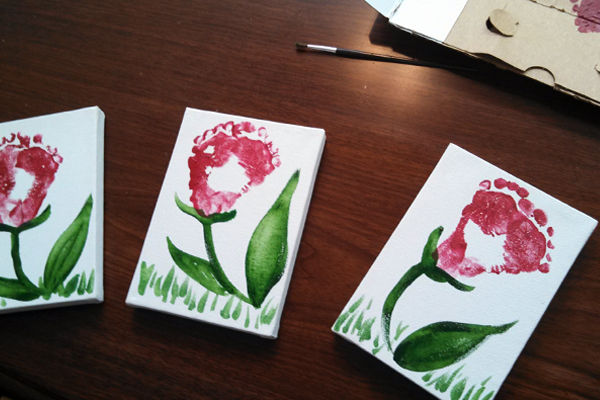 spring art activities for preschoolers Handprint Tulips